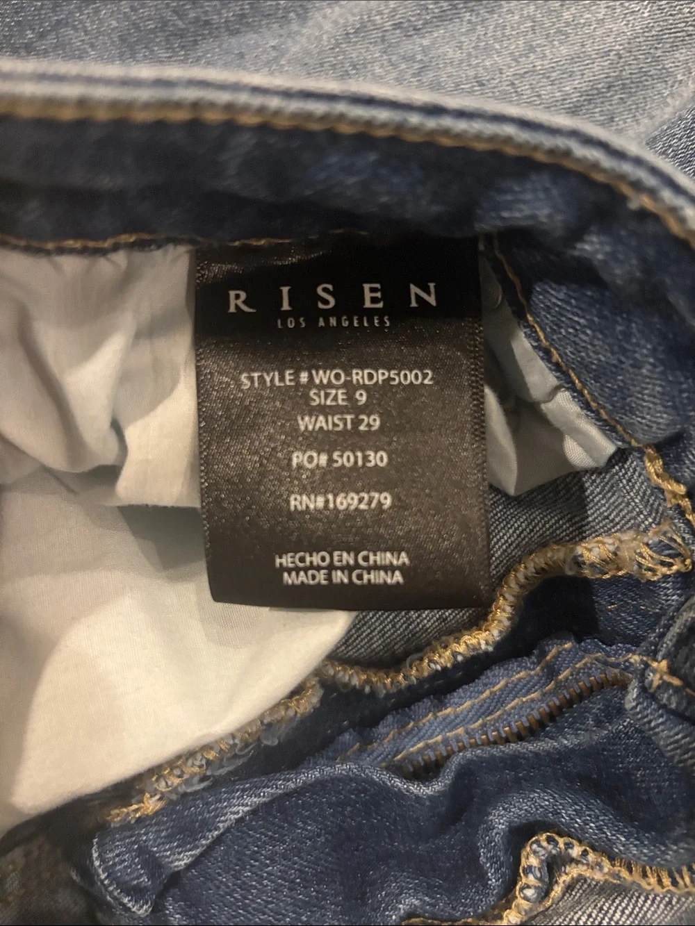Risen Women's Flare Distressed Jeans in Medium Blue